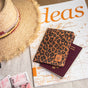

Etui passeport léopard Femme Krishna Leo camel | Freeman T. Porter