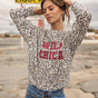 

Sudadera estampada Mujer Saudade Leo Glitter off white | Freeman T. Porter