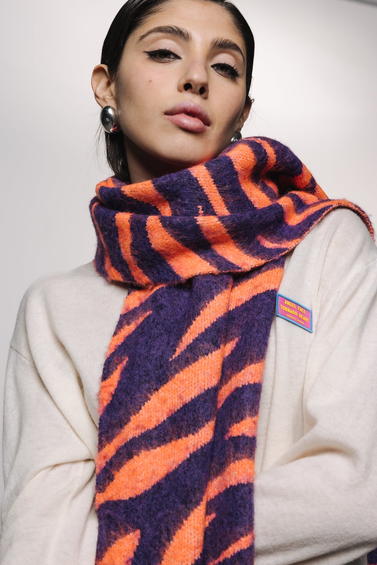 

Écharpe jacquard Femme Pario Zebra orange / purple | Freeman T. Porter