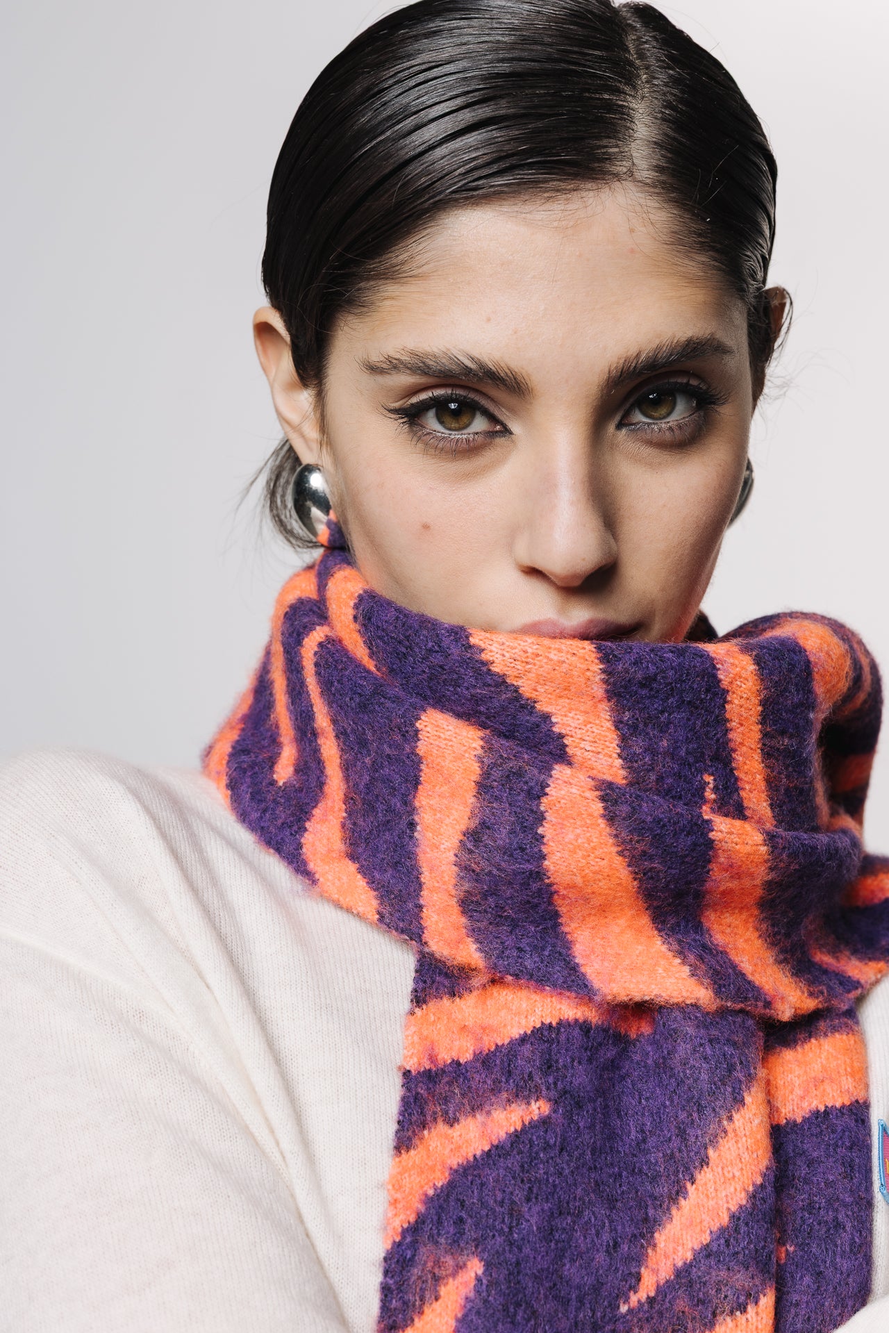 

Écharpe jacquard Femme Pario Zebra orange / purple | Freeman T. Porter